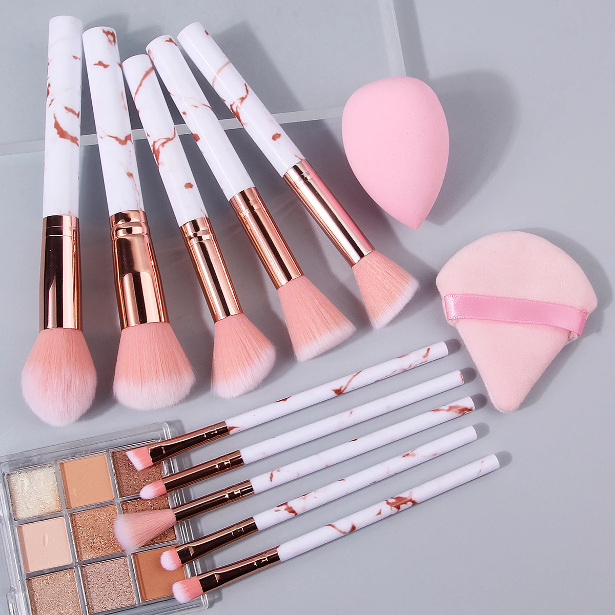 12-teiliges multifunktionales Make-up-Pinsel-Set mit rosa Marmormuster und trockenem und nassem Mehrzweck-Make-up-Schwamm-Puderquasten-Set
