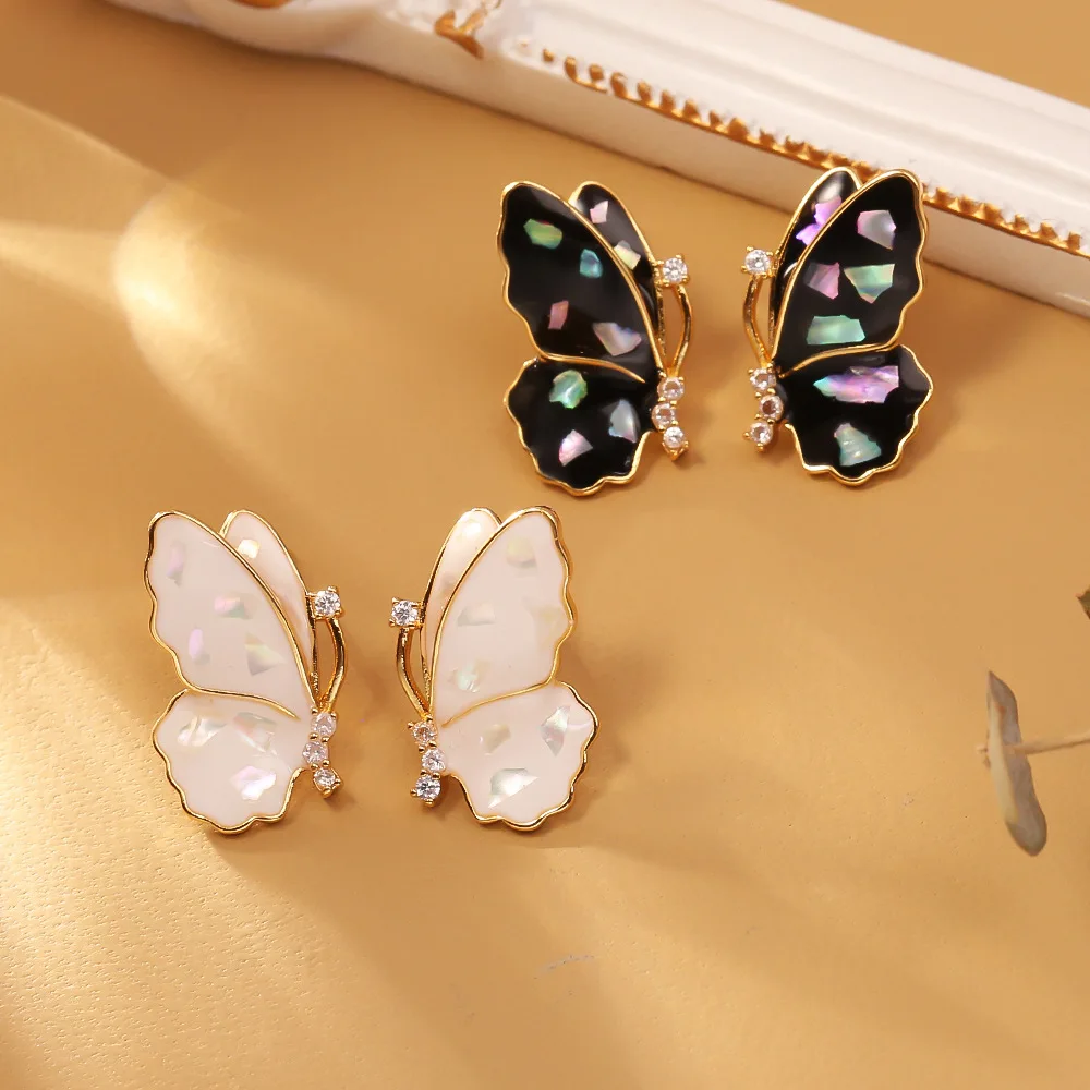 

Fashionable and exquisite glazed broken shell butterfly earrings small fresh and sweet earrings silver needle small earrings