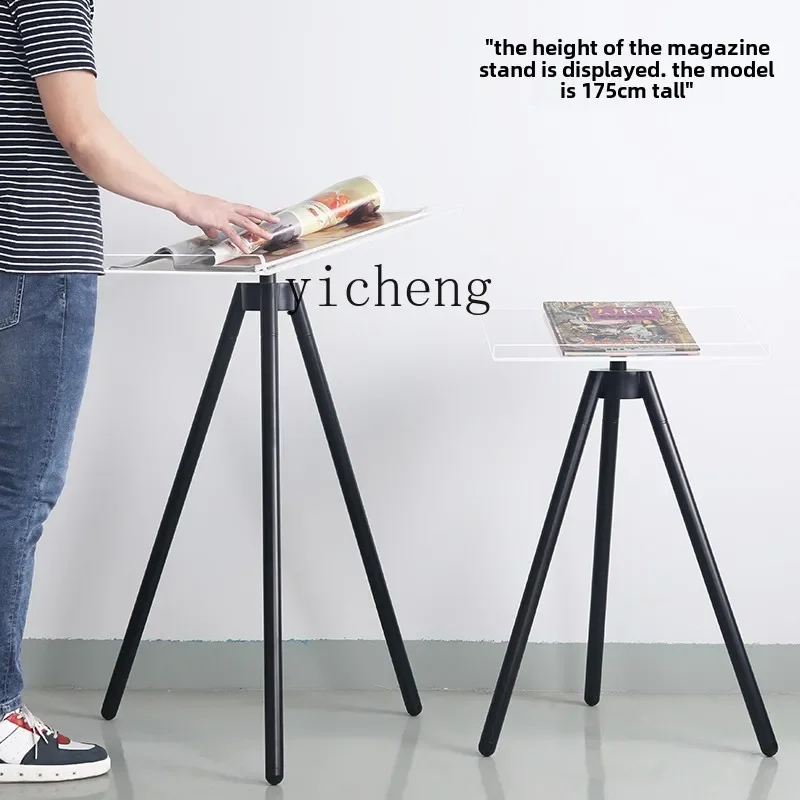 

XL display stand floor-to-ceiling acrylic bookstore photo album turning pages reading big books setting table