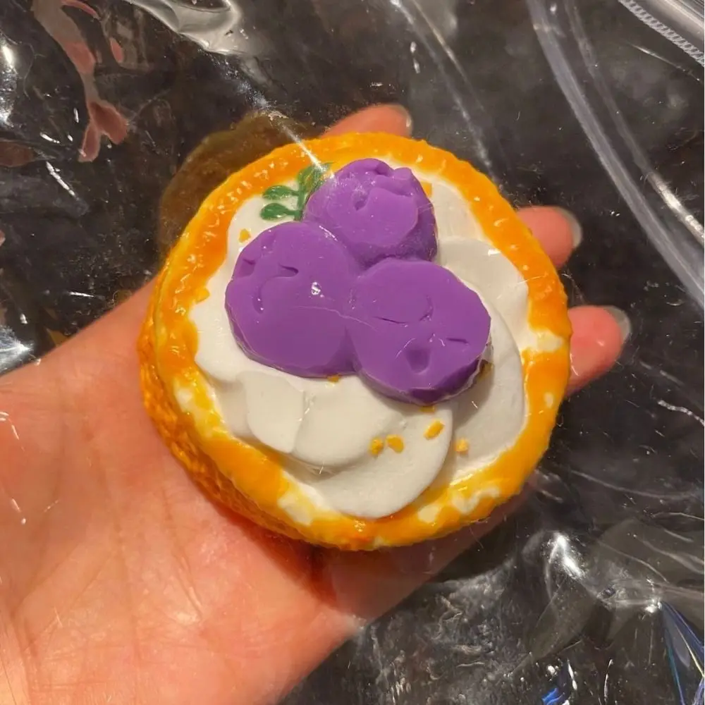 

Cute Cake Soufflé Squeeze Toy Orange Egg Roll Simulation Design Blueberry Cake Squeeze Toy Chocolate Egg Roll Squishy Fingertip