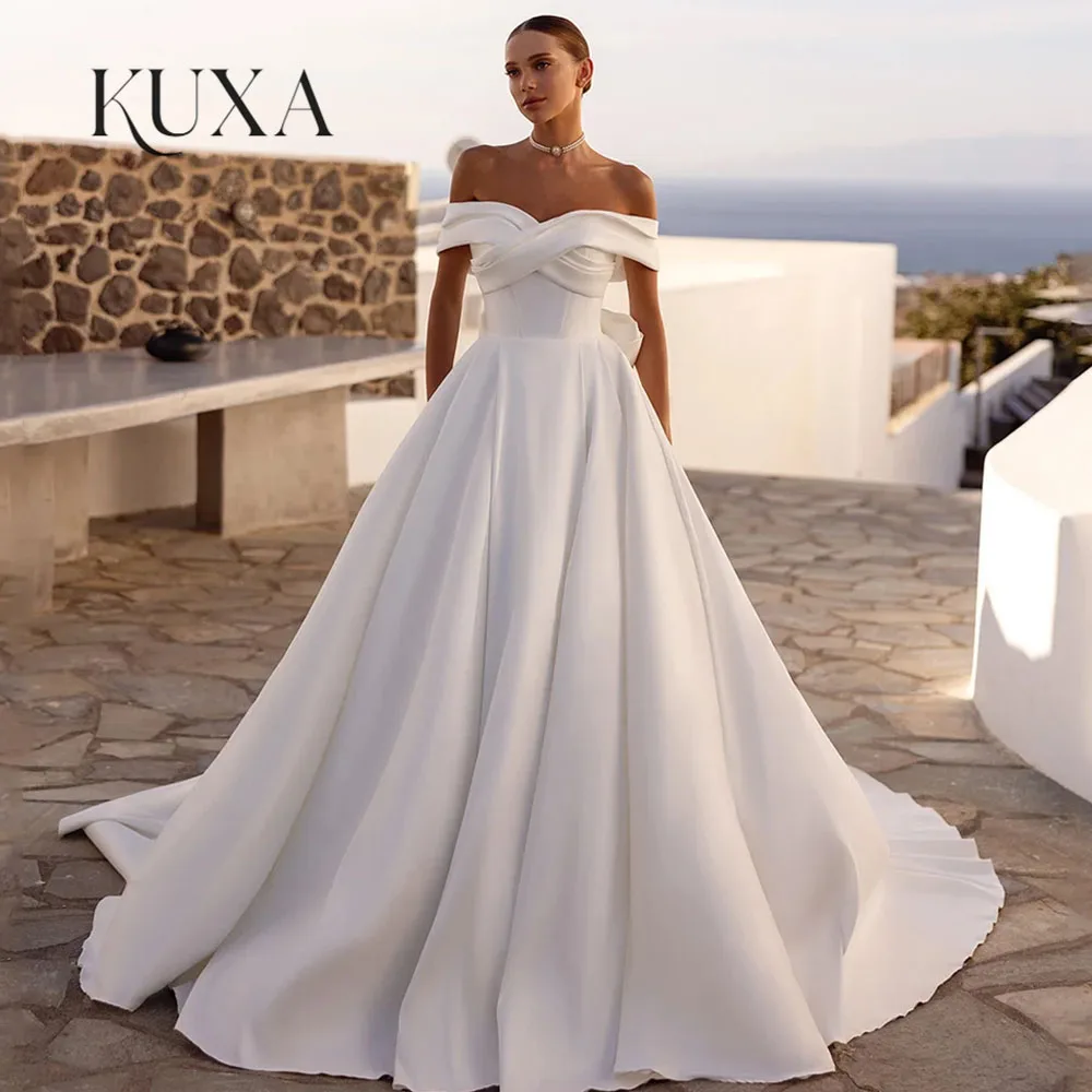 KUXA New Arrival Wedding Dress Customized Off The Shoulder Pleat Back Buttons Bow Sweep Train Vestido De Noiva Bridal Gowns 2026