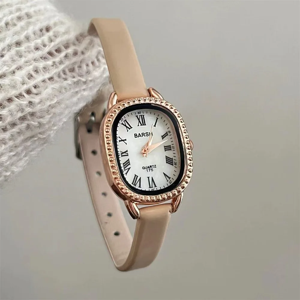 ساعة نسائية بسيطة رفيعة بحزام جلدي موضة بيضاوية بمينا روماني ساعات كوارتز للنساء ساعات يد فاخرة هدية للسيدات