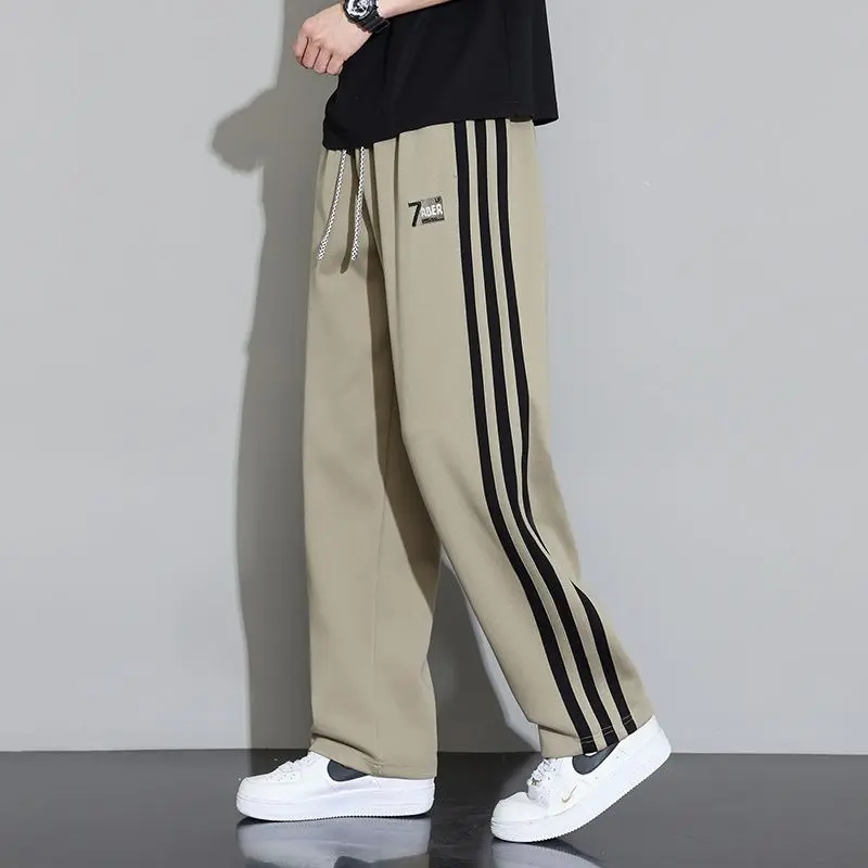 メンズ秋冬スタイルストライプ対照的な色ルーズ多用途カジュアルパンツストレートパンツプラスベルベット肥厚