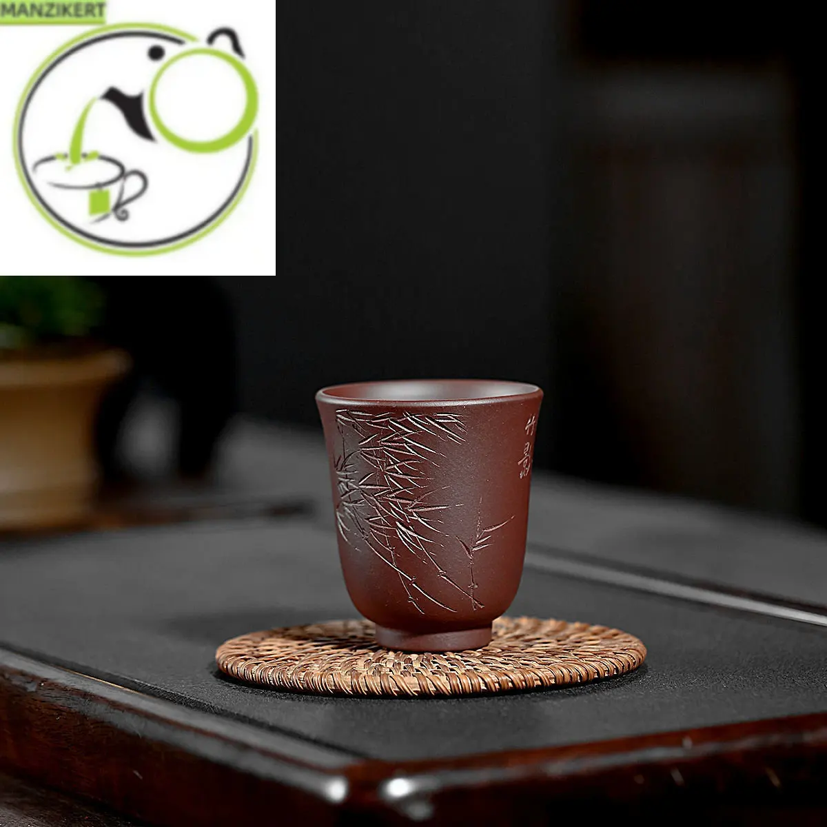 

Yixing purple sand cup raw ore purple mud bamboo shadow cup pure hand-carved 140ml