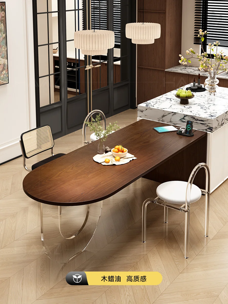 A hardwood dining table in a pre-canned style