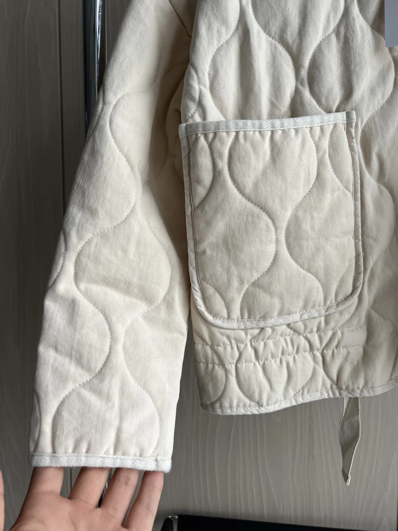 Supplier photo of The Quilted High-Collar Jacket