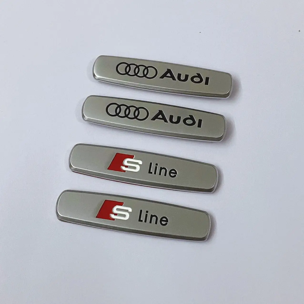 

2PCS car seat back badge car sticker metal sticker is suitable for Audi SlineA3A4LA5A6Q2Q3Q5 car central control seat sticker.