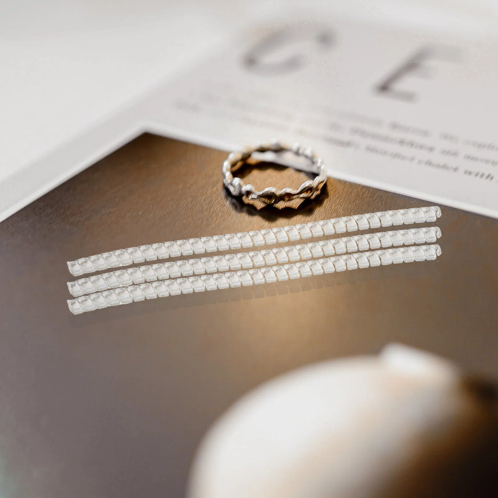 

16Pcs Ring Size Adjuster Universal Fit Jewelry Guard Sizer Reducer for Men Women Adjustable Secure Ring Fixing Piece