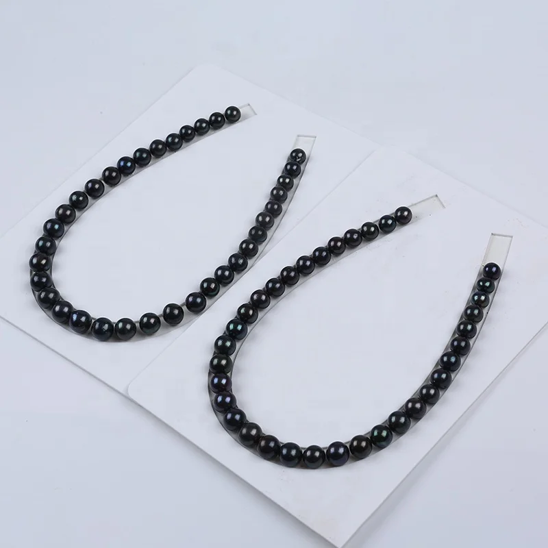 

China manufacturer 10-13mm A/AAA natural black round loose pearl for jewelry making