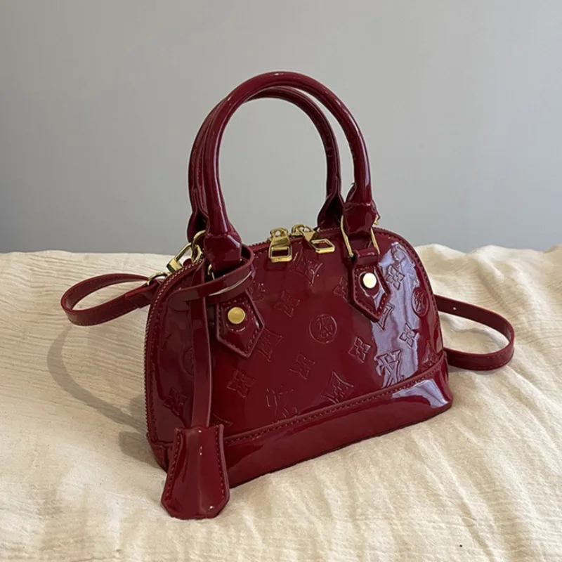 2026 New Wine Red Vernis Patent Leather Embossed Shell Handbag Ladies Mini Alma BB Top Handle Bag Detachable Strap Crossbody Sho