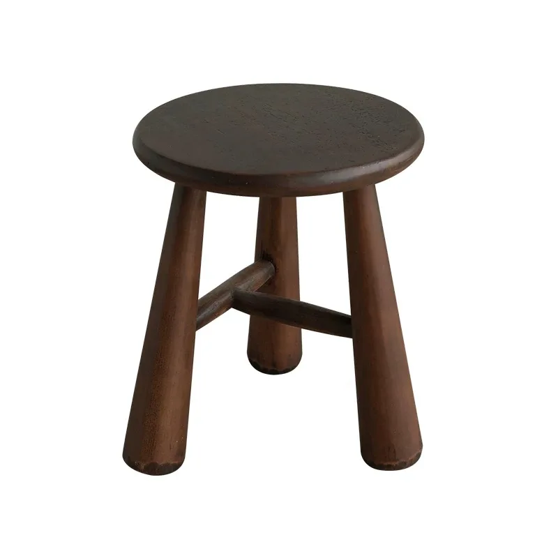 

Vintage Round Wooden Stool, Dark Brown, Solid Wood Construction, 3-Leg Design with Cross Support, Rustic Side Table