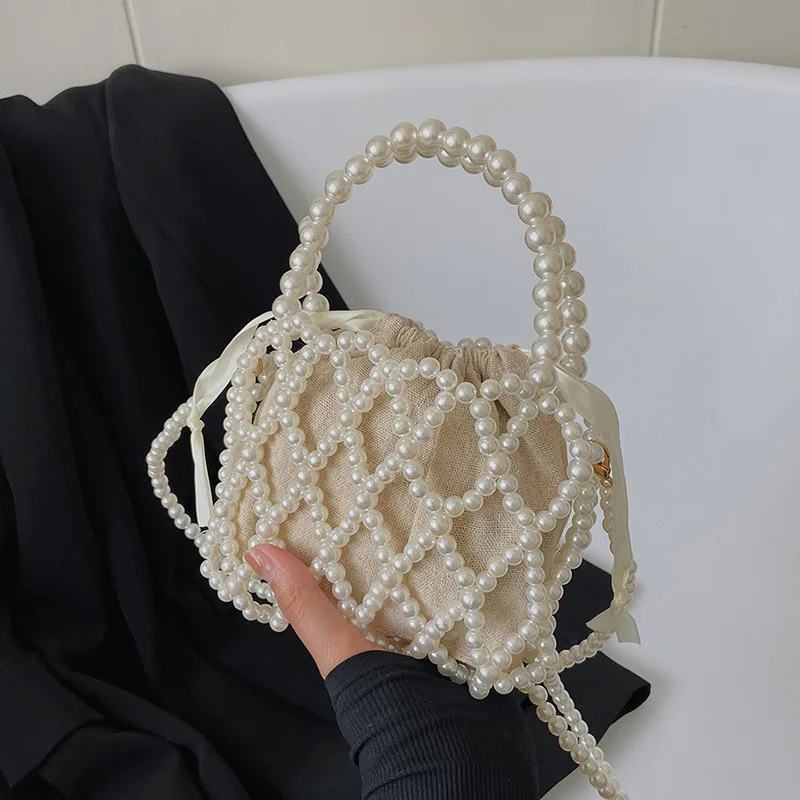 2022 nowy niszowy, wysokiej jakości plażowy z wcięciem, tkany perłowy materiał akrylowy modne codzienne torby Crossbody dla kobiet