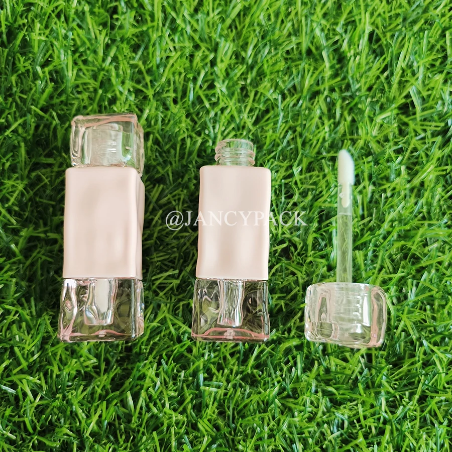 تصميم جديد 2 مل الوردي تويست فريد أنبوب ملمع الشفاه الفارغ أنابيب زيت الشفاه شعار مخصص تغليف مستحضرات التجميل