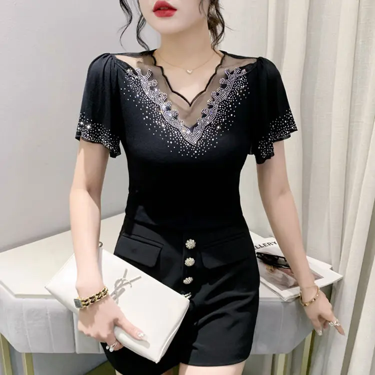 2025 夏の新中空ファッションダイヤモンド半袖 Tシャツ女性のためのスリム蓮の葉スリーブプルオーバー