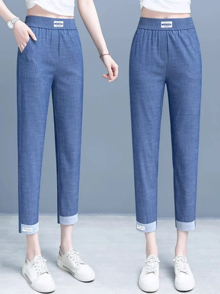 

Женские джинсы из ледяного шелка больших размеров, тонкие, свободные, прямые, летние, укороченные, с отворотами, в стиле харем, с высокой талией, корейский стиль