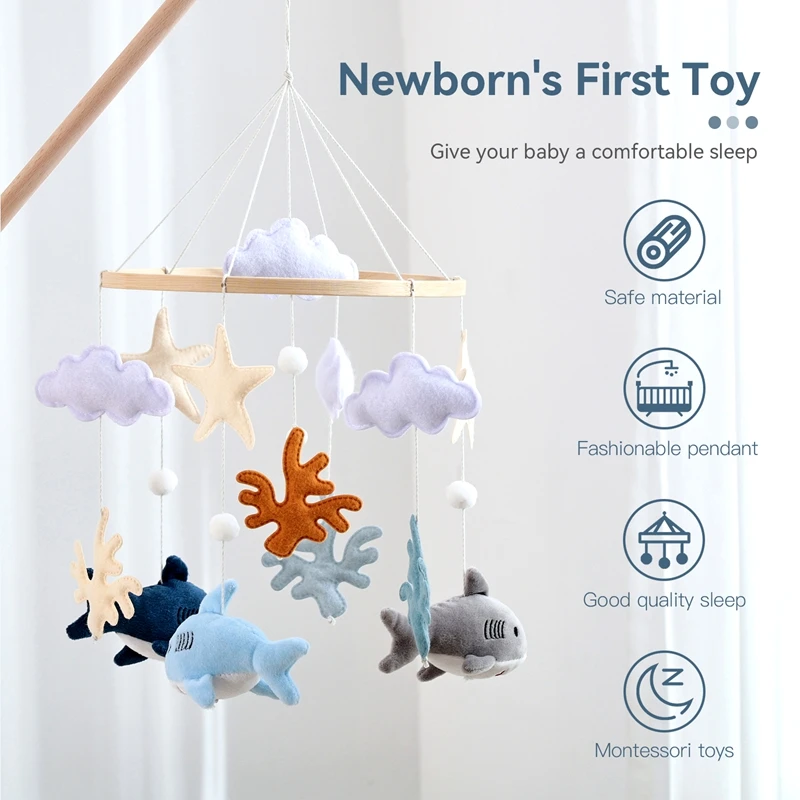 ตาปลาฉลามกลมของเด็กมอนเตสซอรี่มีเสน่ห์น่ารัก และจี้ปลาและปลาดาวขนาดเล็กที่แขวนมีสีสันสดใส