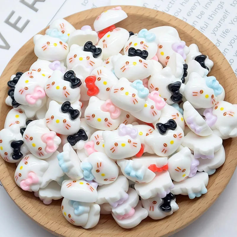 50 ชิ้นเคลือบเงา Hello Kitty โบว์เล็บ Charms - ธีมวันหยุดเรซิ่นเล็บสําหรับงานรื่นเริงเล็บ