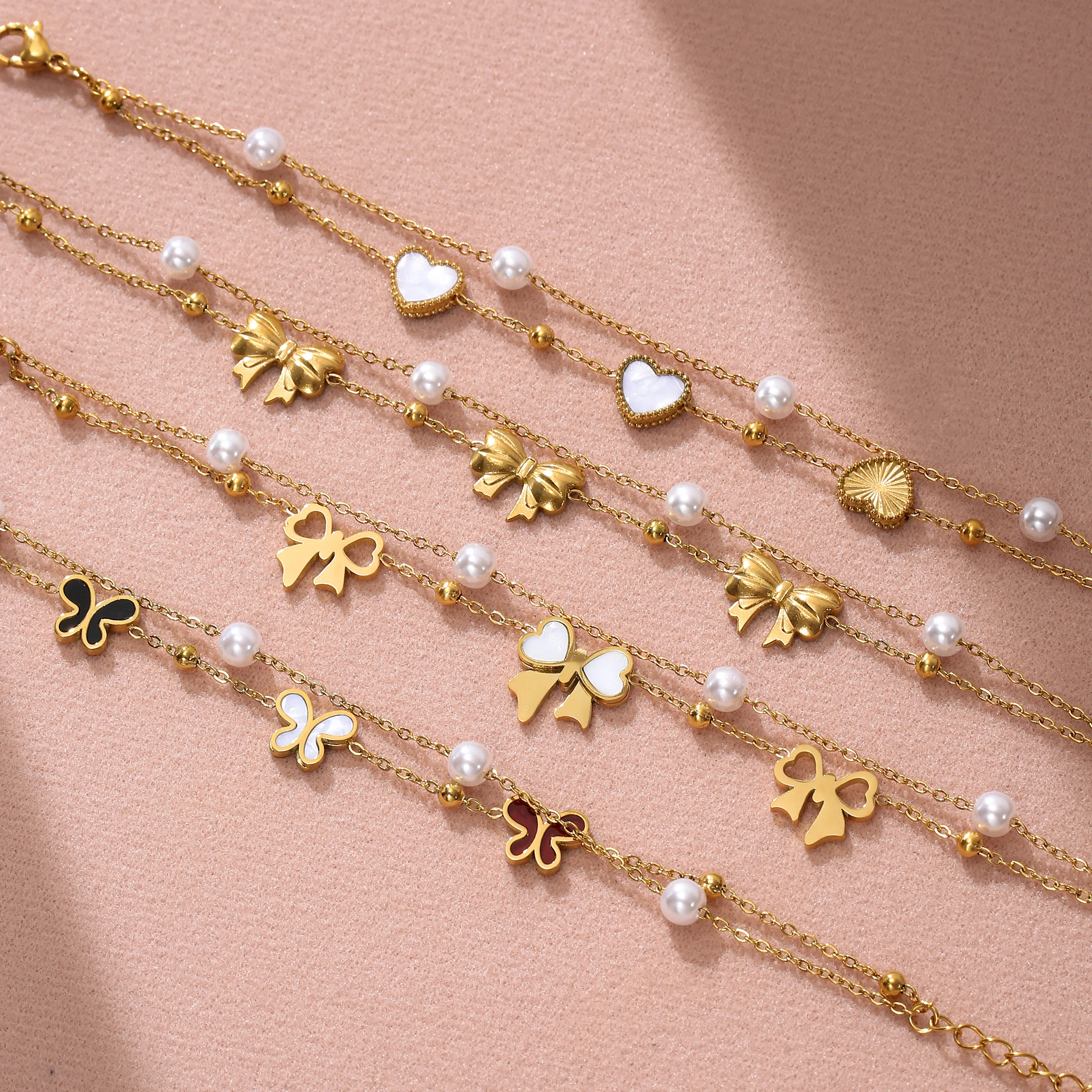 

Golden Tone Stainless Steel Double-Layer Bow Charm Bracelet with Imitation Pearls for Women