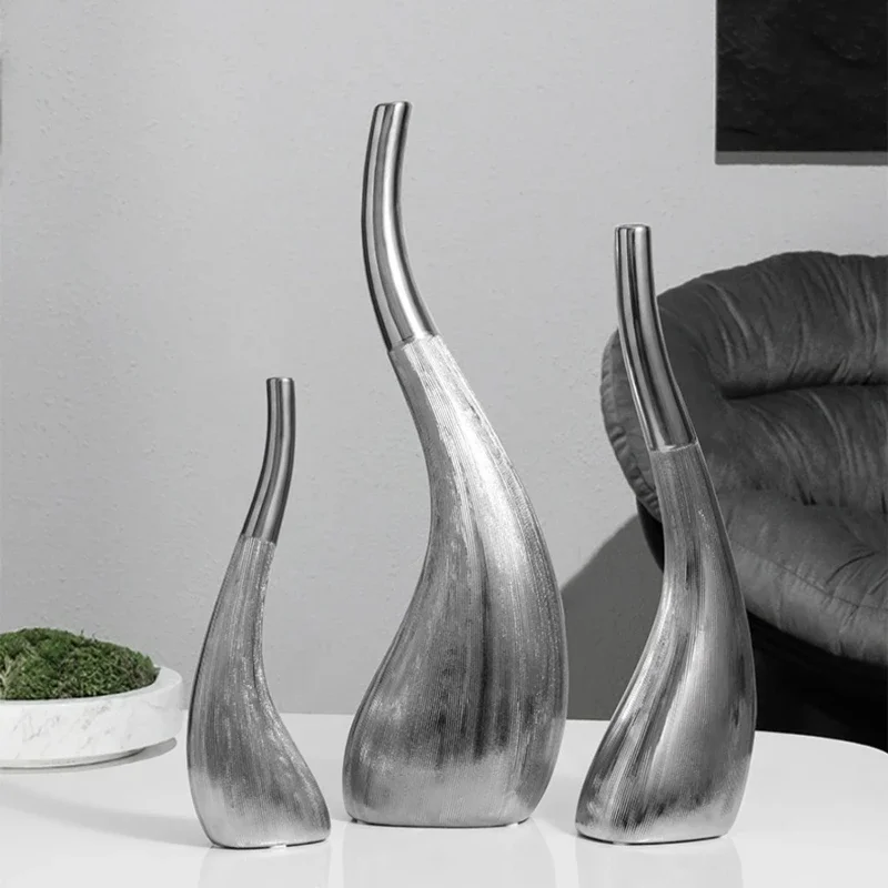 

#Modern minimalist and creative silver curved bottle TV cabinet decorations, home soft decoration decorations
