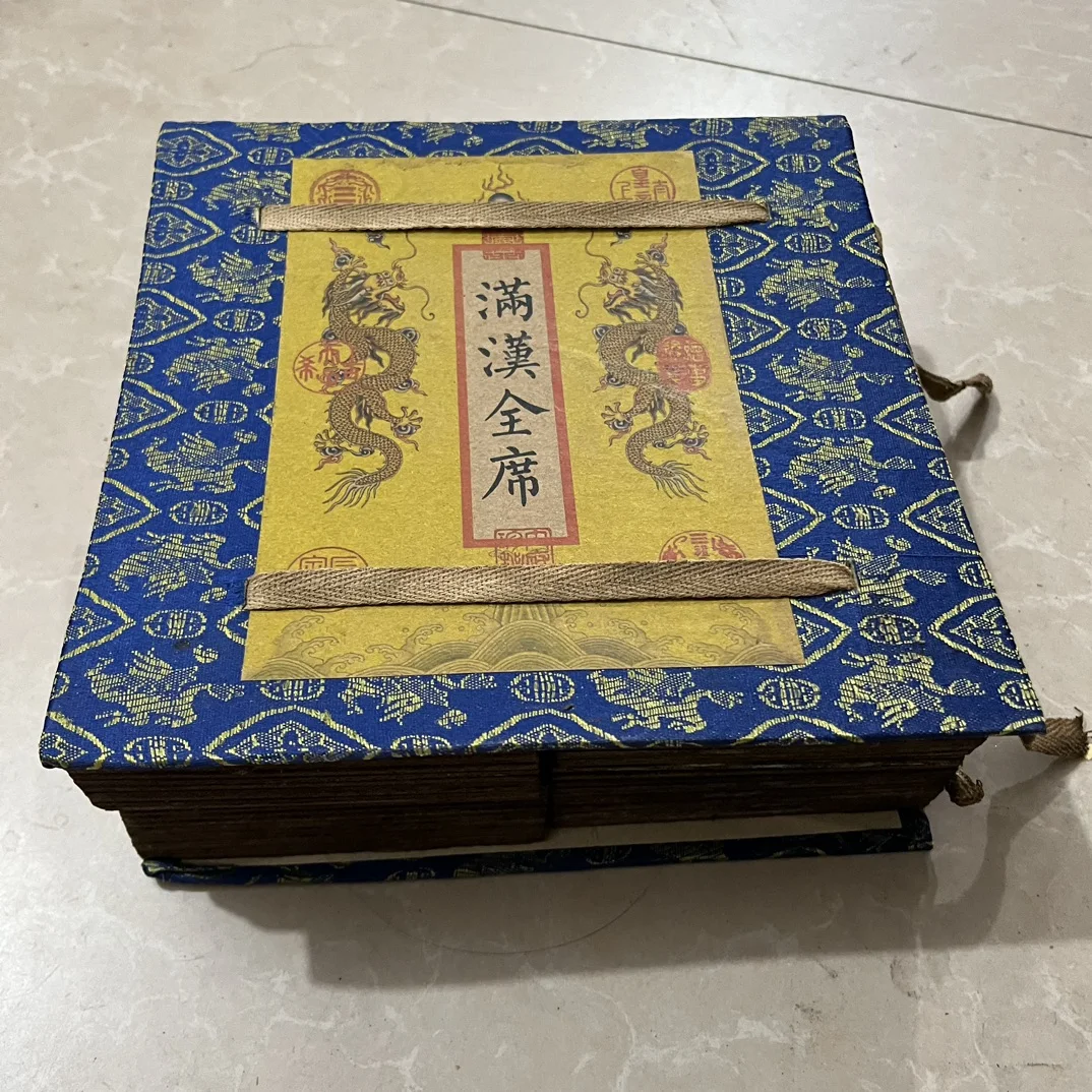 

A set of four old handwritten books on Chinese culinary culture and cooking techniques (Manchu and Han Quanxi)