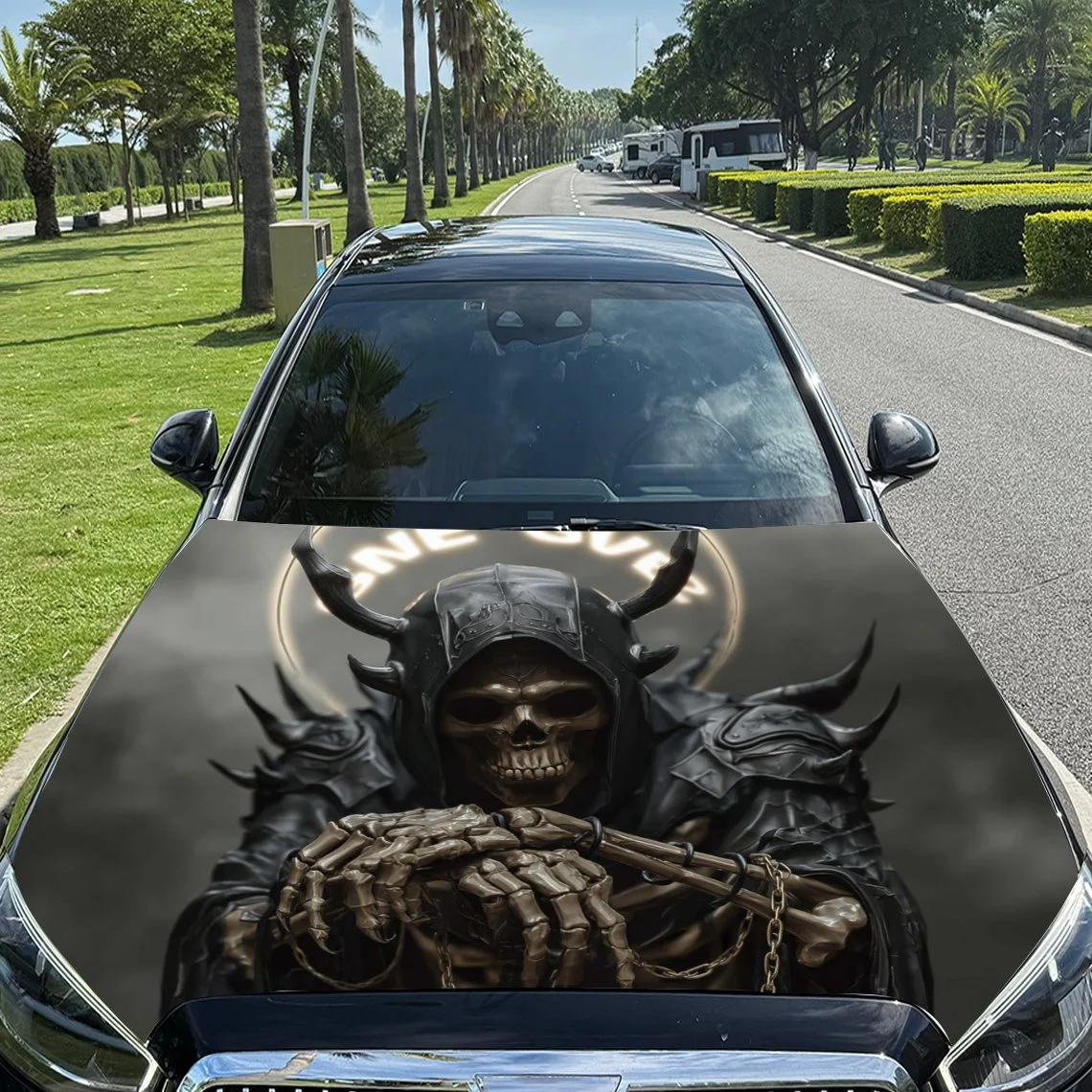 

Grim Reaper design on car hood, featuring a skeletal figure in dark armor with horns and a staff, set against a dramatic backgro