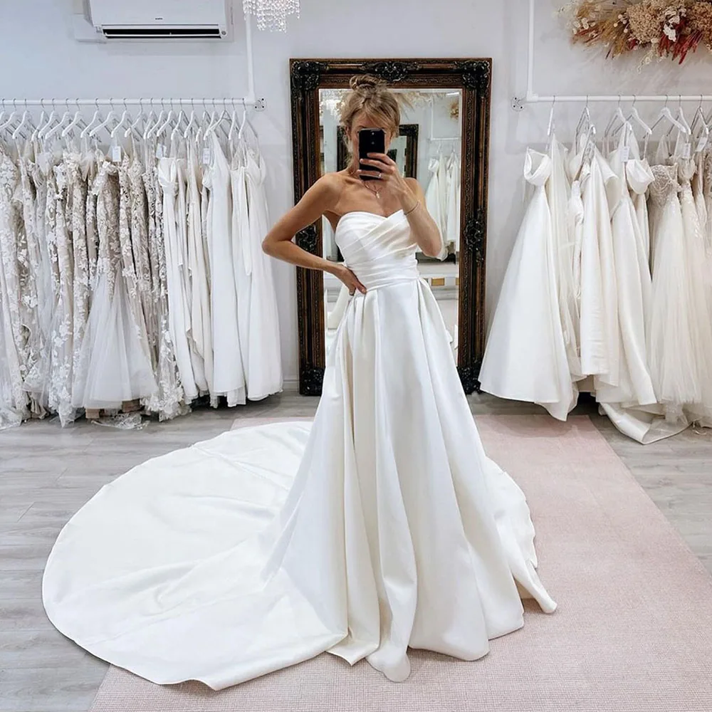 

Msikoods Elegant Satin Wedding Dresses Sweetheart A-Line Pleats Bridal Gown Backless Sleeveless Royal Train Princess Bride Dress