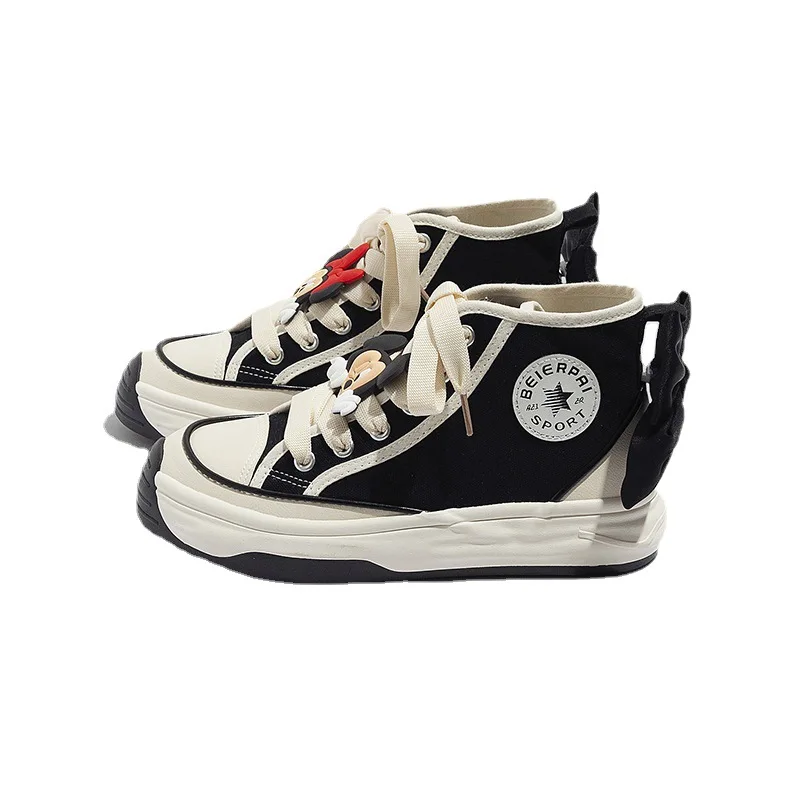 Anime Mickey Minnie scarpe di tela alte da donna moda nuova suola morbida scarpe Casual nero grande fiocco scarpe da donna versatili regali