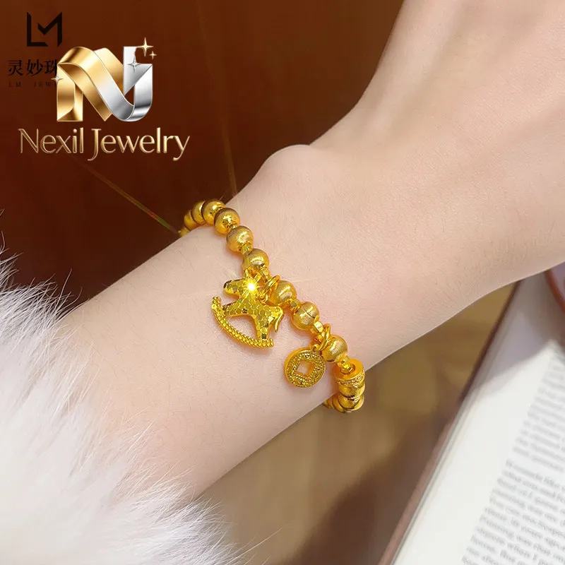 

Nexil Jewelry Nexil Jewelry Rocking Horse Cat Eye Disco Bead Bracelet Women's 24K Gold AU999 - Playful dynamic rocking horse,