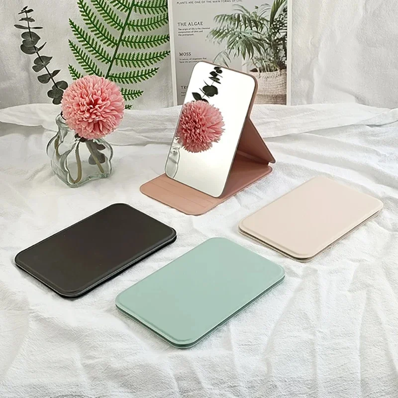 Woman MINI Folding Makeup Mirror High-quality Portable Pocket Makeup Mirror Single-side Creative Women Solid Color Handle Desk image 3