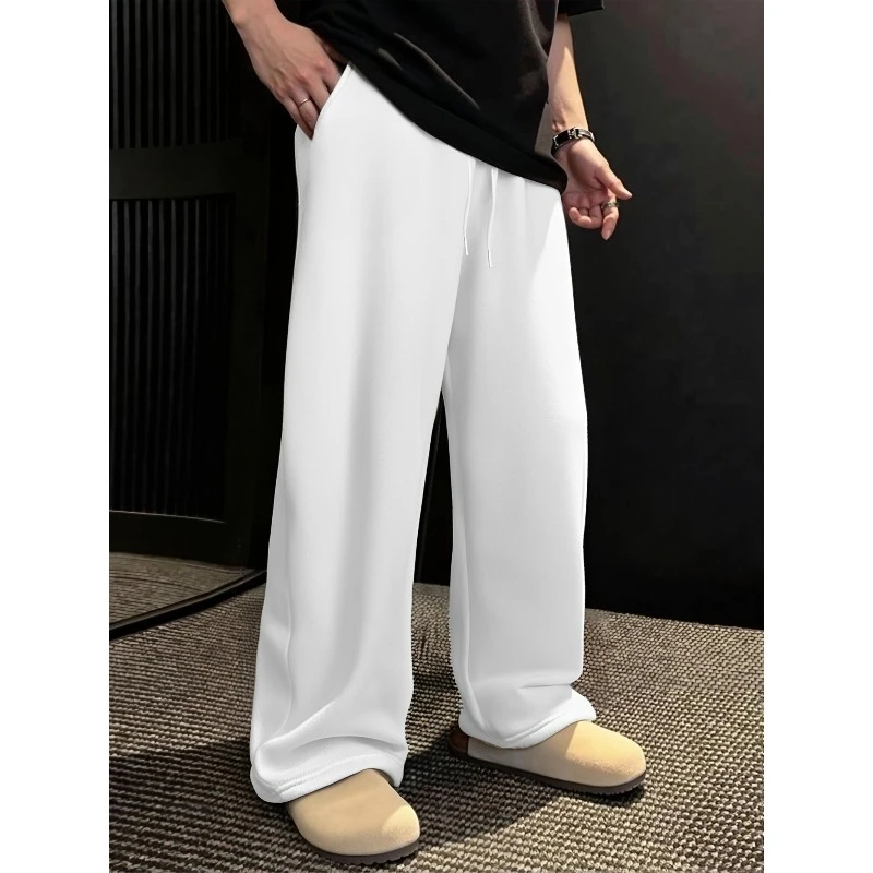 

Men Versatile Solid Color Drawstring Loose Casual Sports Long Pants, Suitable for Outdoor and Home Leisure in Spring and Autumn