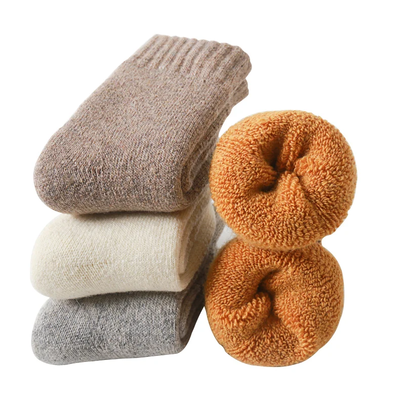 4 pairs of children's wool socks, thick and warm in winter, suitable for outdoor hiking and daily wear for children aged 3-15.