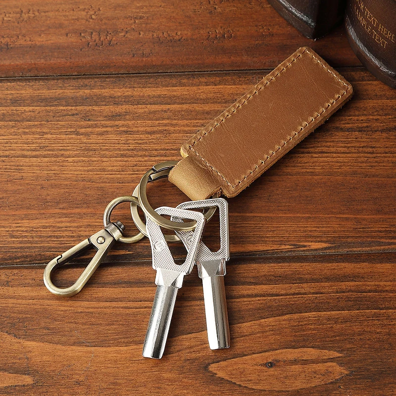 Porte-clés rétro en cuir véritable et cuir de vachette, porte-clés de voiture anti-perte personnalisé, pendentif fermoir ster corrigé en métal, mode