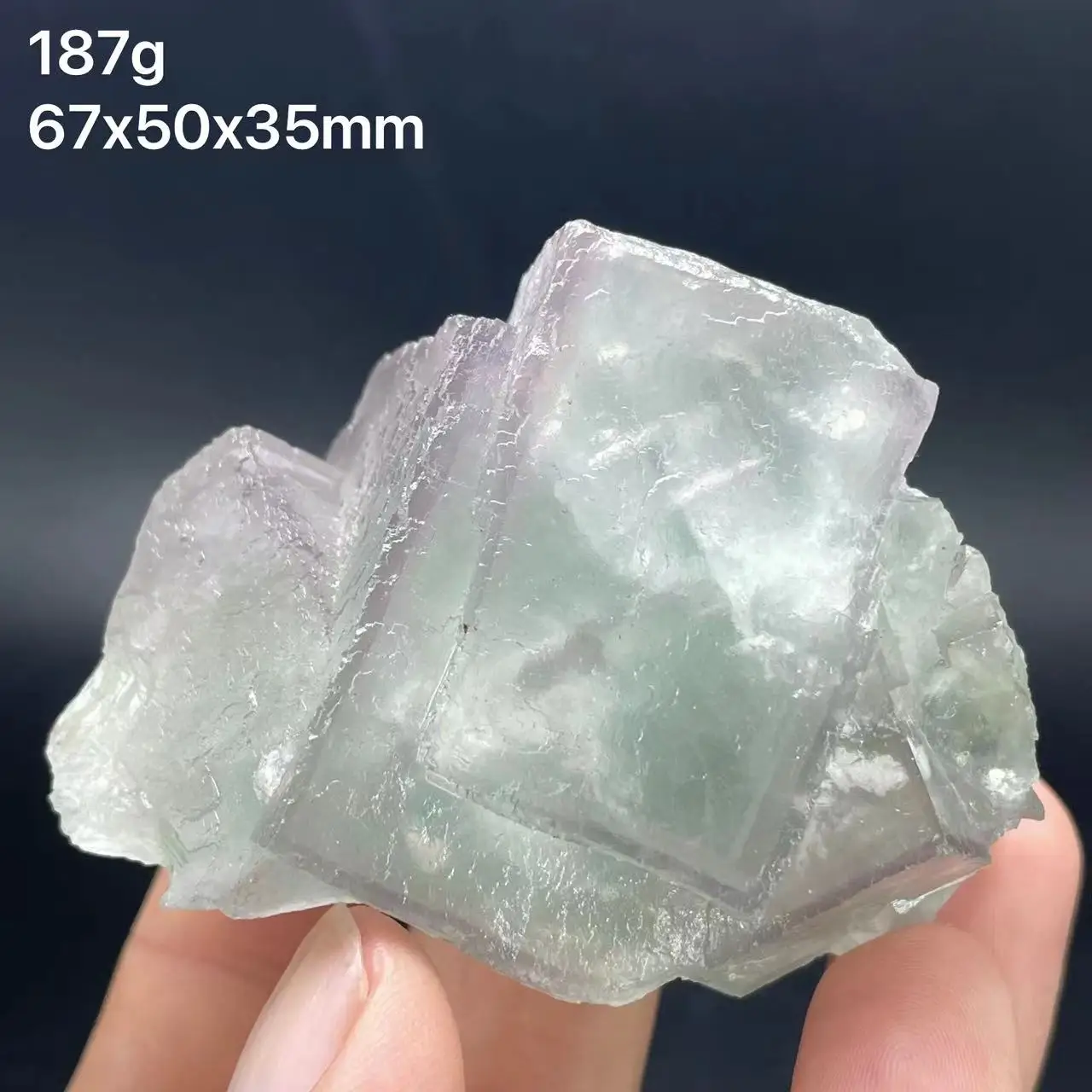 

The new 100% natural green purple fluorite cubic mineral crystal comes from Xianghualing