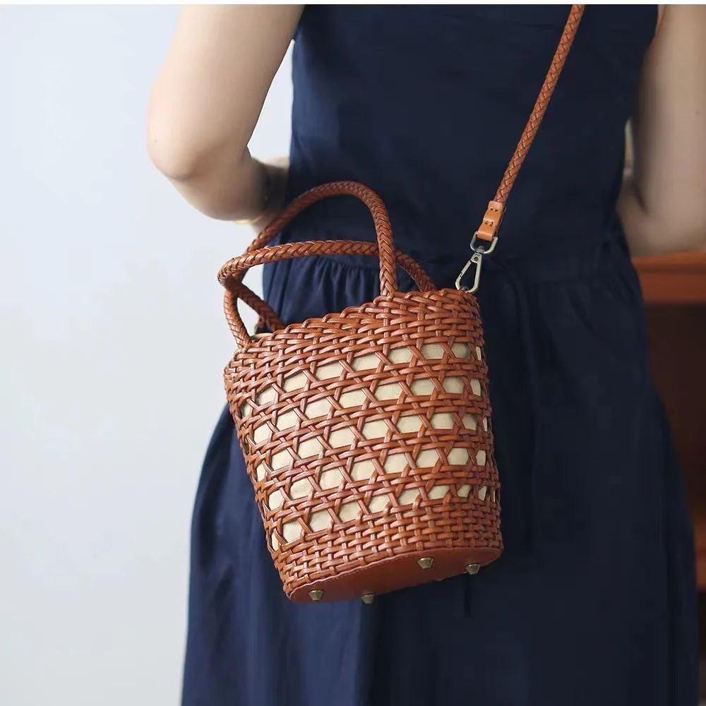 

French Hollow Leather Woven Bag Retro Cowhide Handmade Bucket Handbag Shoulder Crossbody Rattan Bag Convenient Vacation Style