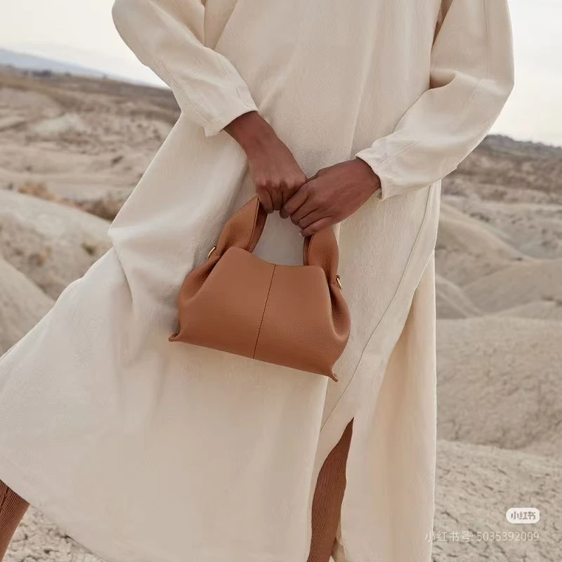 

2026 French Fashion Ladies Niche Cloud Bag, Shoulder Crossed Dumpling Bag, Fashionable Cowhide Handbag