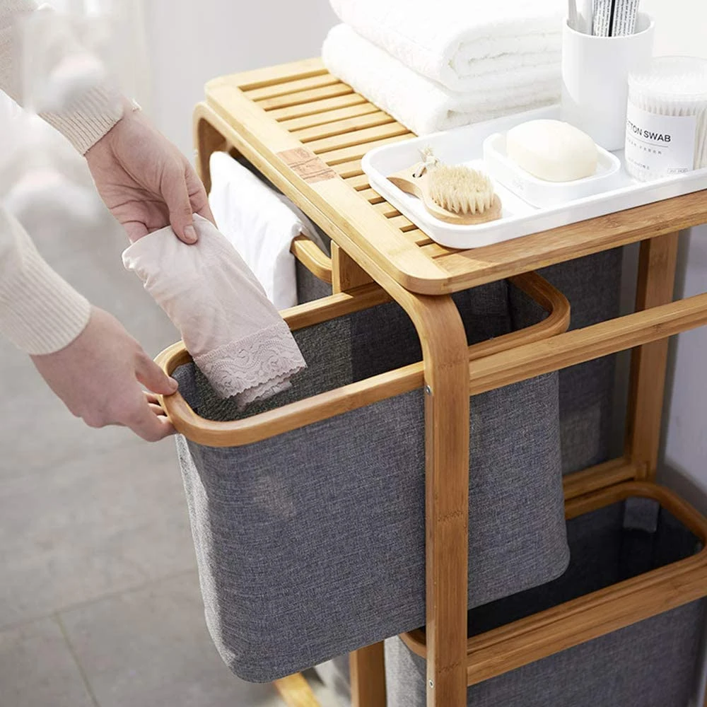 I controsoffitti cavi a tre divisori faciliscono la classificazione del drenaggio e conservare i cestini per vestiti sporchi