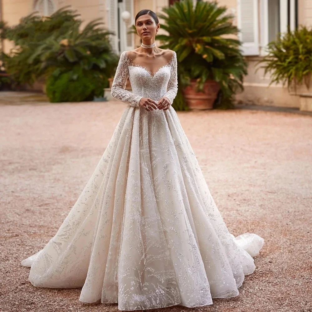 

Свадебные платья трапециевидной формы по индивидуальному заказу с круглым вырезом и аппликациями с открытой спиной и скользящим шлейфом, свадебное платье с длинными рукавами, кружевное платье из бисера Robe de Mariée