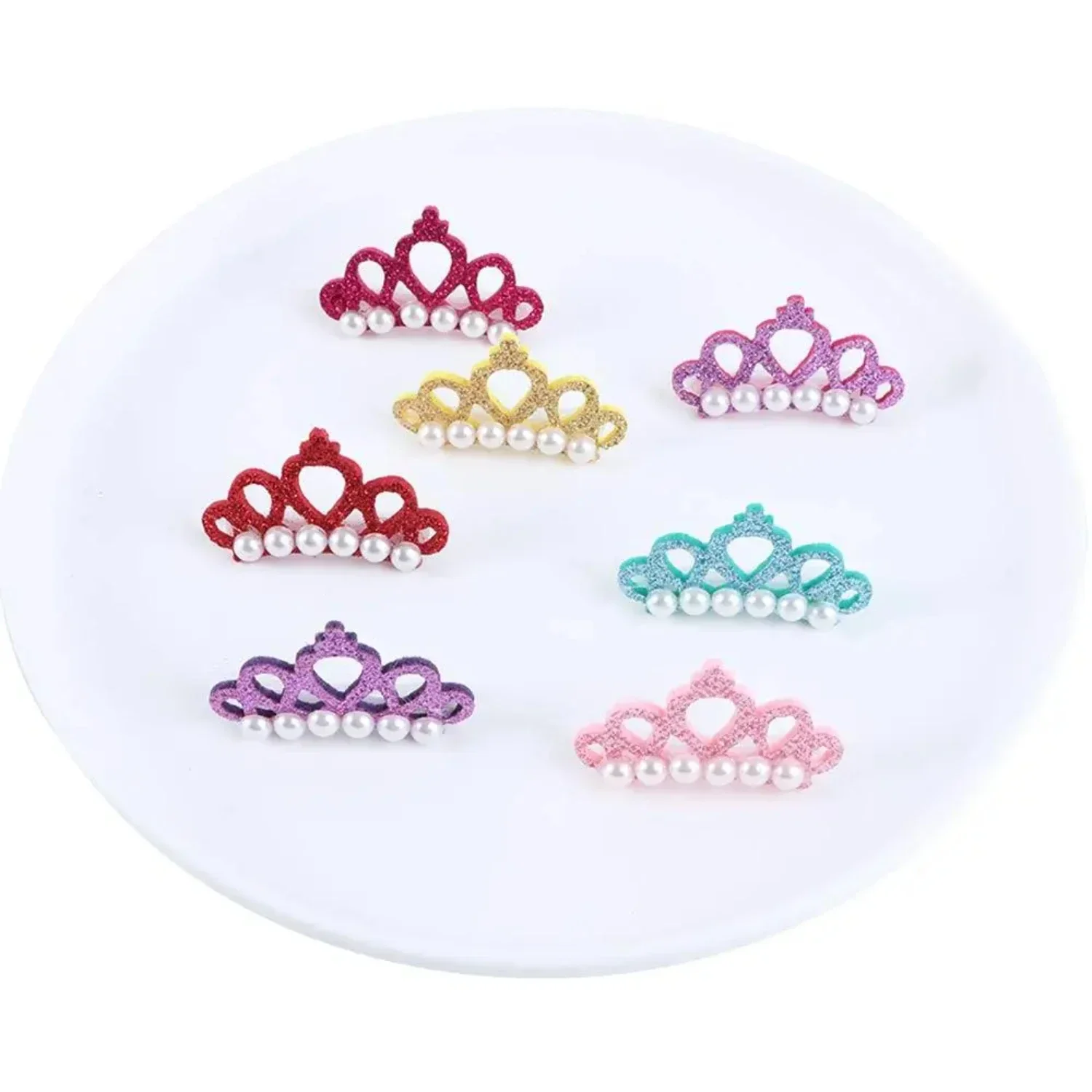 

Adorable and charming faux pearl crown-shaped pet hair clips for styling and grooming your beloved furry friend with elegance. S