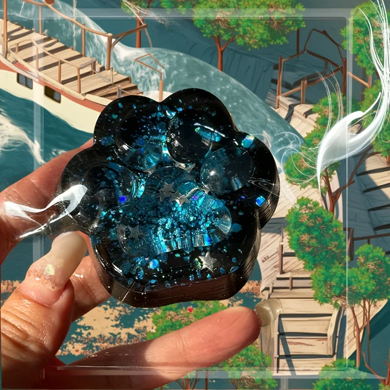 Juguete relajante blando con forma de pata de gato de galaxia: diseño de brillo azul translúcido y negro de crecimiento lento, divertido recuerdo de fiesta o regalo de cumpleaños para Gi