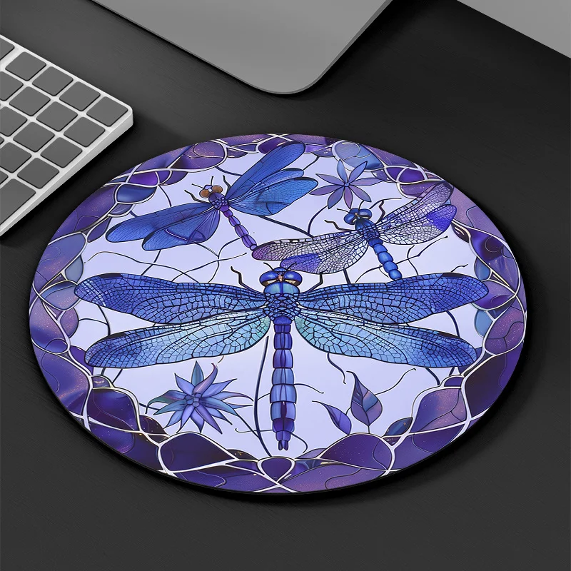Purple dragonfly patterned round mousepad is waterproof anti-slip and made of durable rubber suitable for both gaming and office