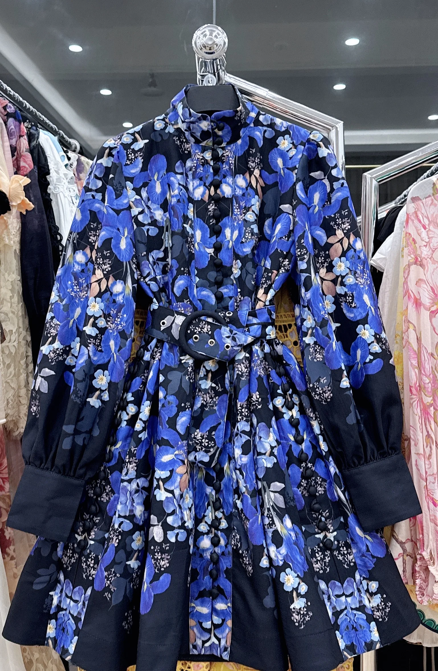 

In the autumn of 2025, a mature and elegant lady's printed dress with long sleeves