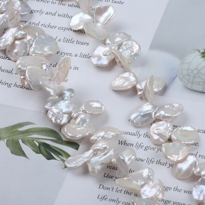 

Wholesale 13-16mm White Color Top Drilled Irregular Petal-shaped Freshwater Pearl Loose Strand