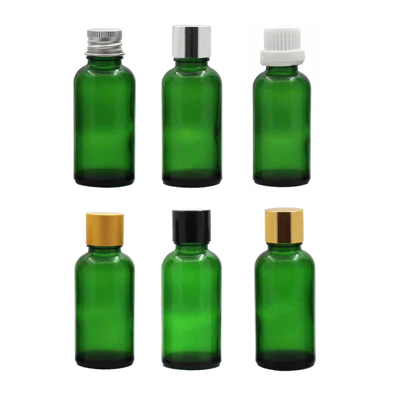 24 pezzi 5 ml 10 ml 15 ml 20 ml 30 ml 50 ml 100 ml Bottiglia di olio essenziale di vetro verde Bottiglia vuota per imballaggio cosmetico Cura personale con coperchio