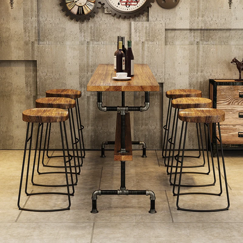 Industrial style retro water pipes, iron art solid wood bar tables and chairs, milk tea shop bars, high legged tables and chairs