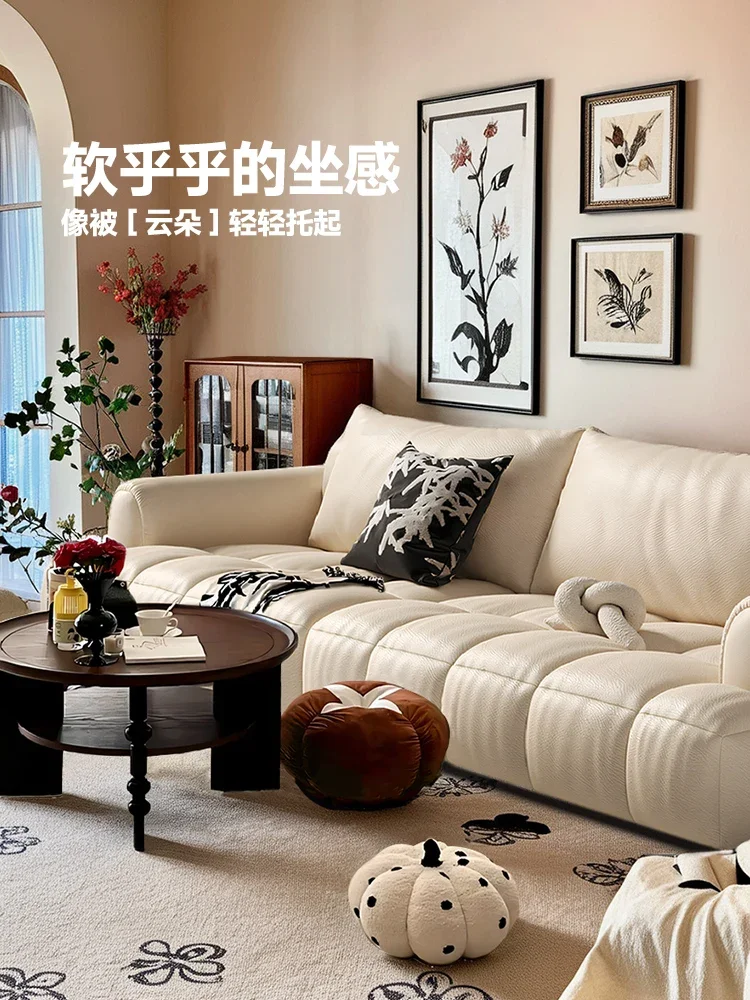 Leather sofa puff top layer cowhide marshmallow cream wind French living room piano keys