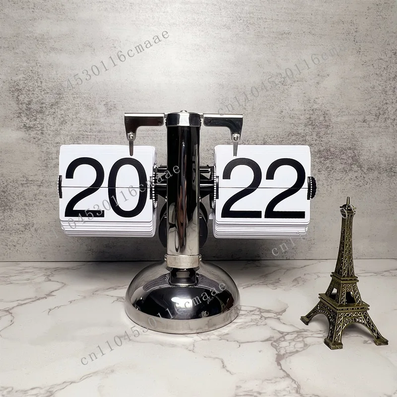 Automatic page turning clock European retro simple living room clock small balance mechanical page turning clock