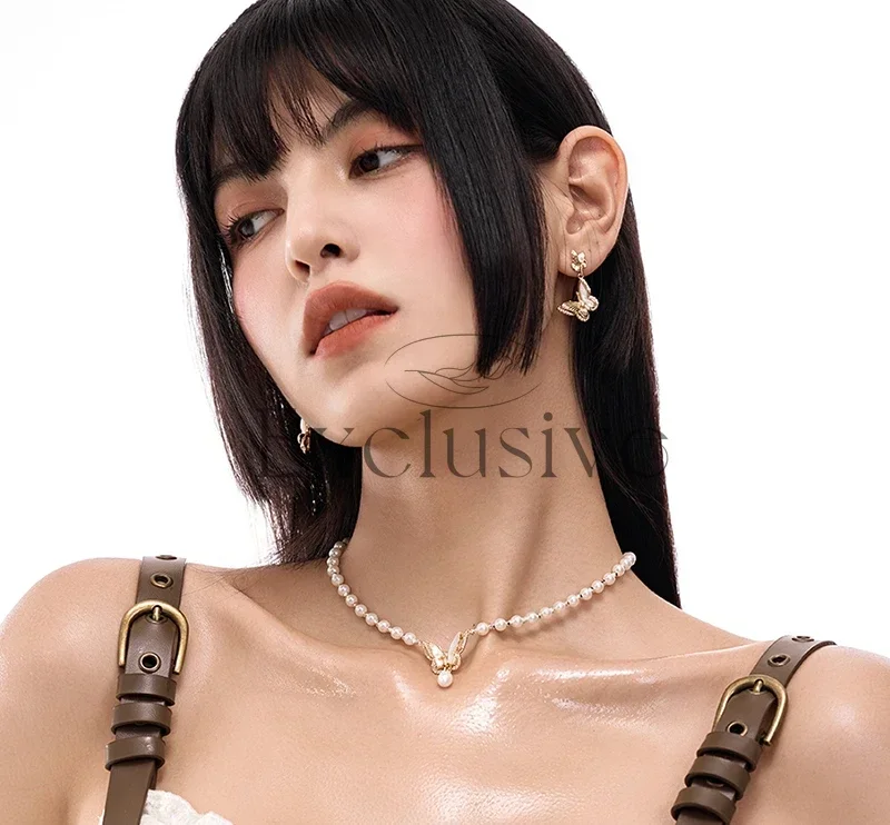 Golden white Fritillary twin butterfly earrings, full of high-end sense