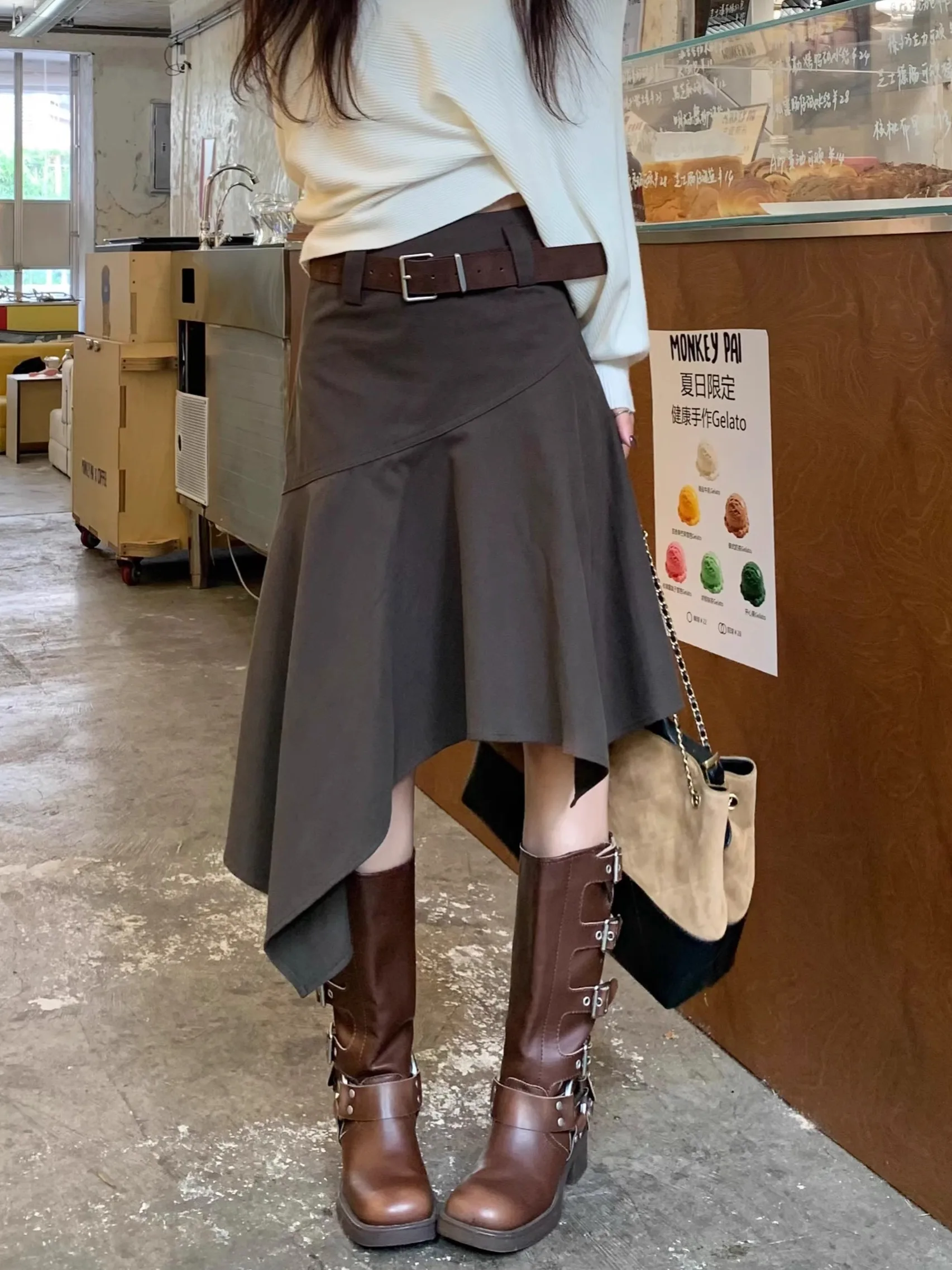 

Высокое качество, хит продаж, оптовая продажа, новая ретро нерегулярная полуюбка кофейного цвета с высокой талией, нишевая юбка трапециевидной формы средней длины для женщин