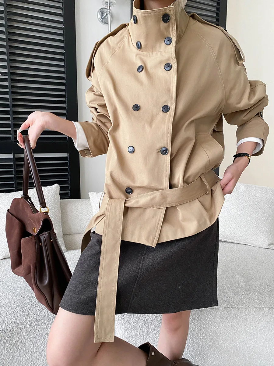 Autumn women's casual solid color British style stand up collar double row buckle tied waist windbreaker jacket
