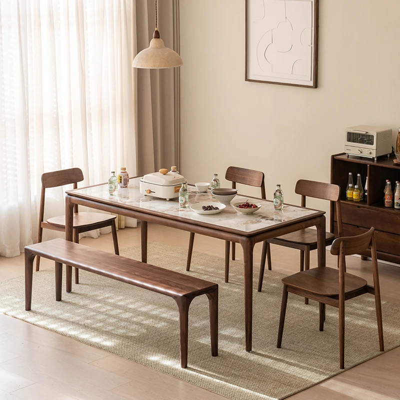 

Modern simple North American walnut rock slab dining table and chair combination Nordic solid wood living room rectangular medie